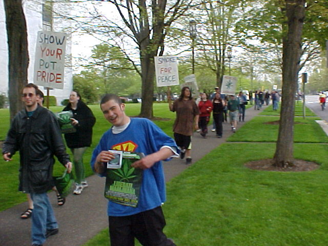 Salem MMM
Marchers parading down Court street on the side-walk.  Drive-bys continue to show support with honks, thumbs-up and various shouts of encouragement